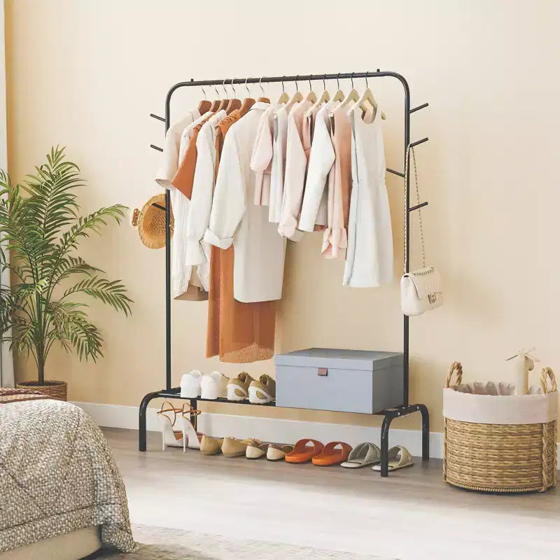 Porte-vêtements métallique de 50 pouces de large avec 8 crochets et étagère de rangement pour la buanderie